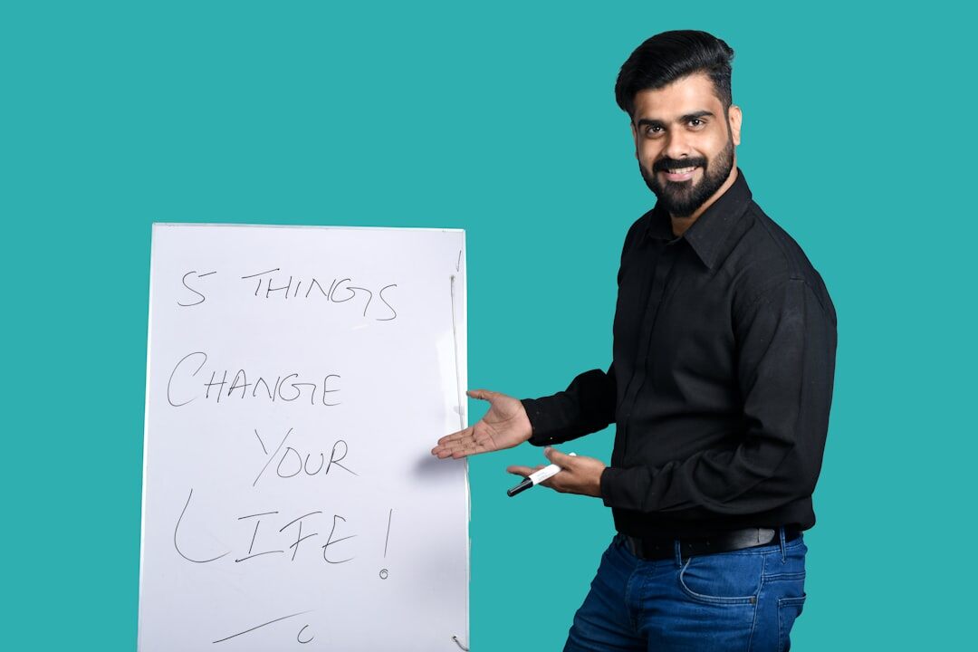 Consultant explaining a strategic framework on a whiteboard